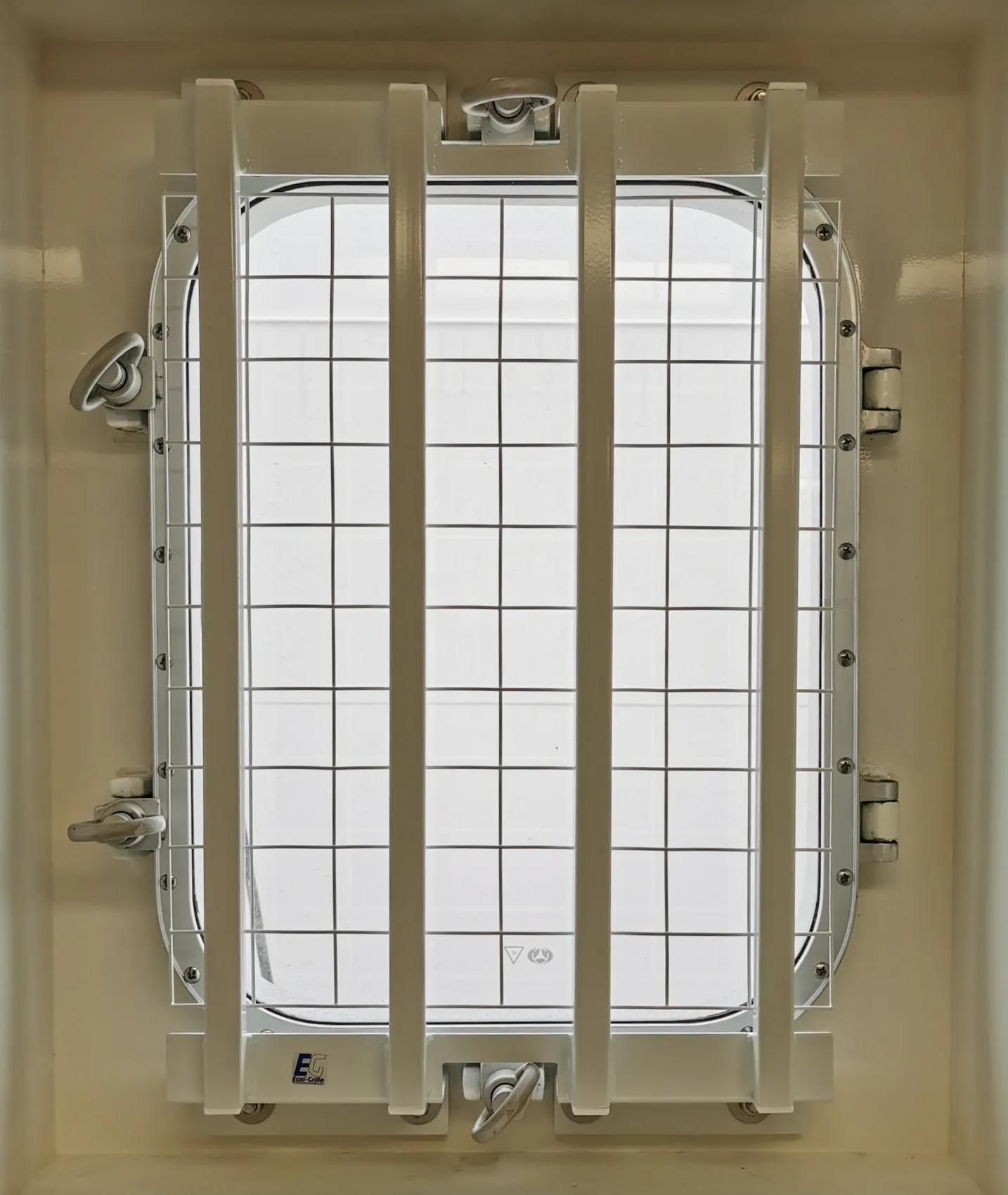 Easi-Grille porthole security grille installed on ship window